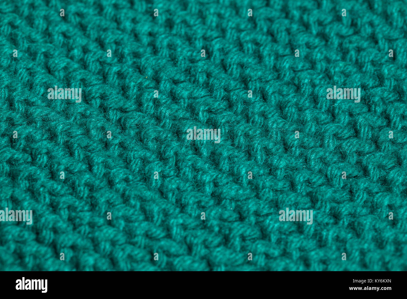 Macro color image of green knitted texture Stock Photo - Alamy