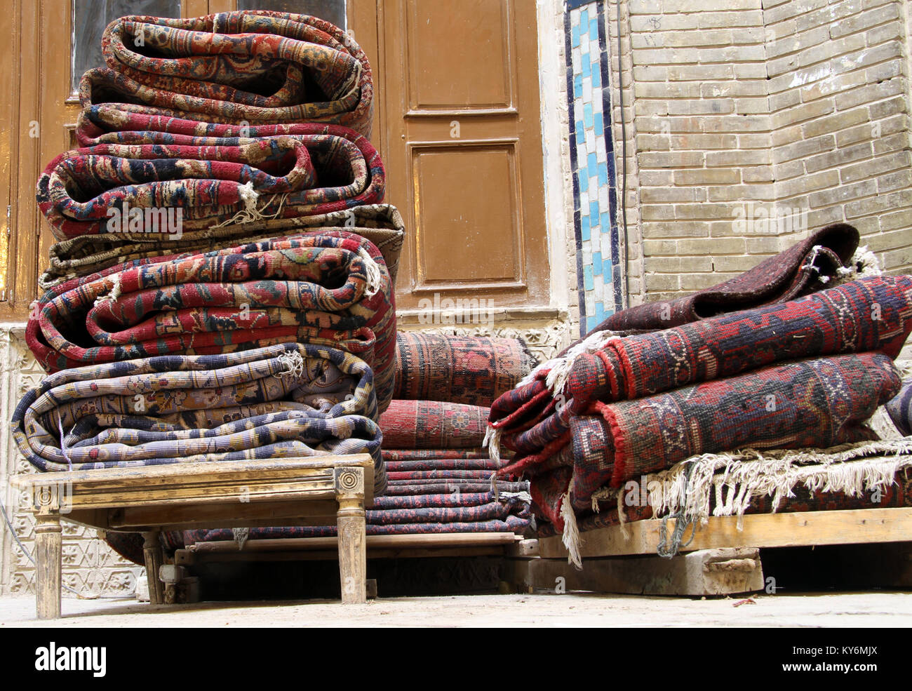 Persian carpets on the stall in bazaar in Kashan, Iran Stock Photo Alamy