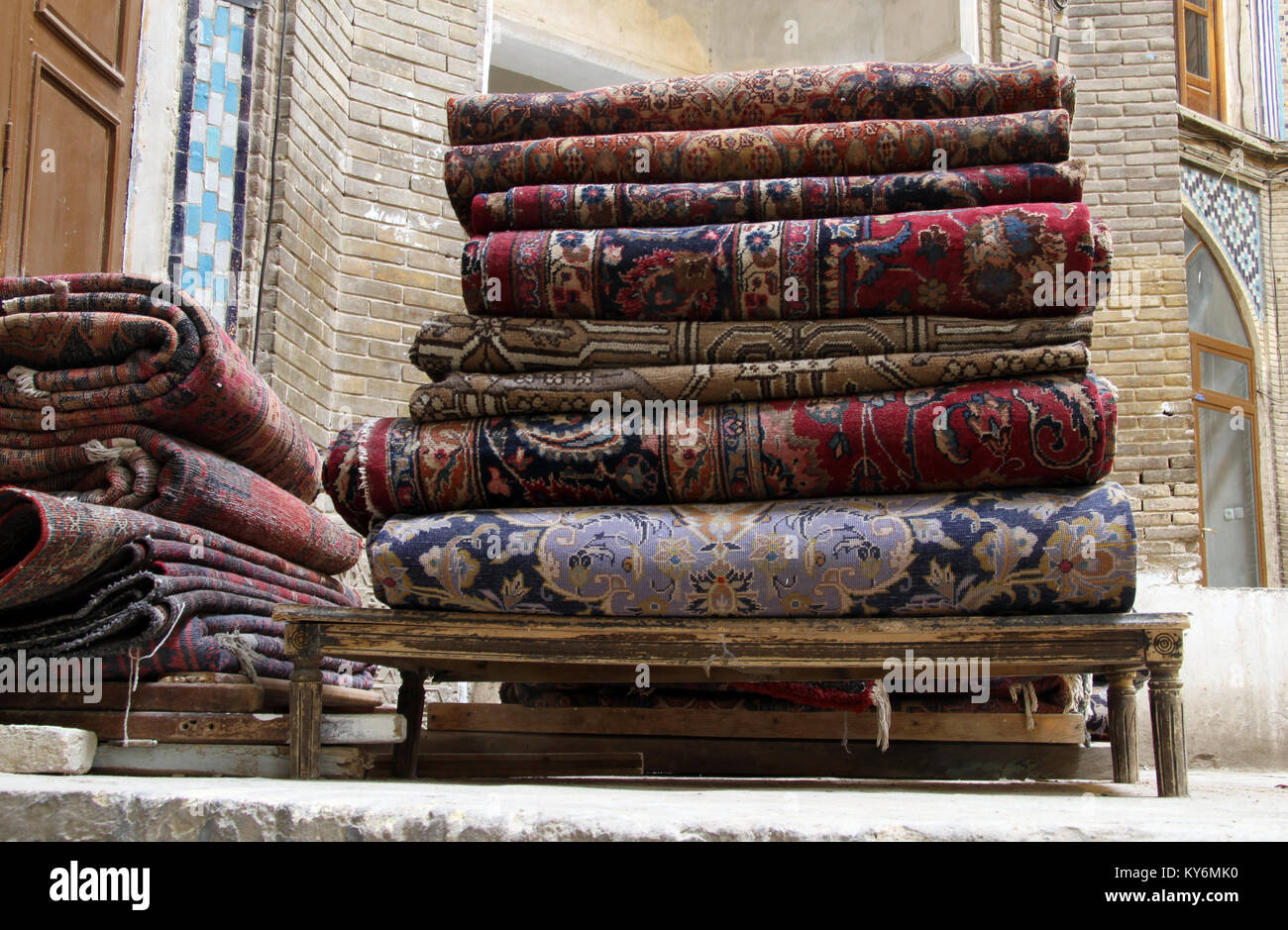 Persian carpets on the stall in bazaar in Kashan, Iran Stock Photo Alamy