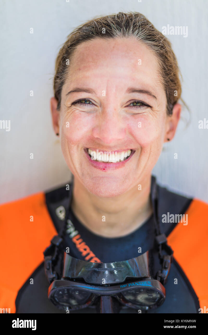 SAN ANDRES ISLAND, Colombia   Circa March 2017. Funny Smiling  Freediver Portrait after 7 days of Diving and Raccoon Sunburn Print. Stock Photo