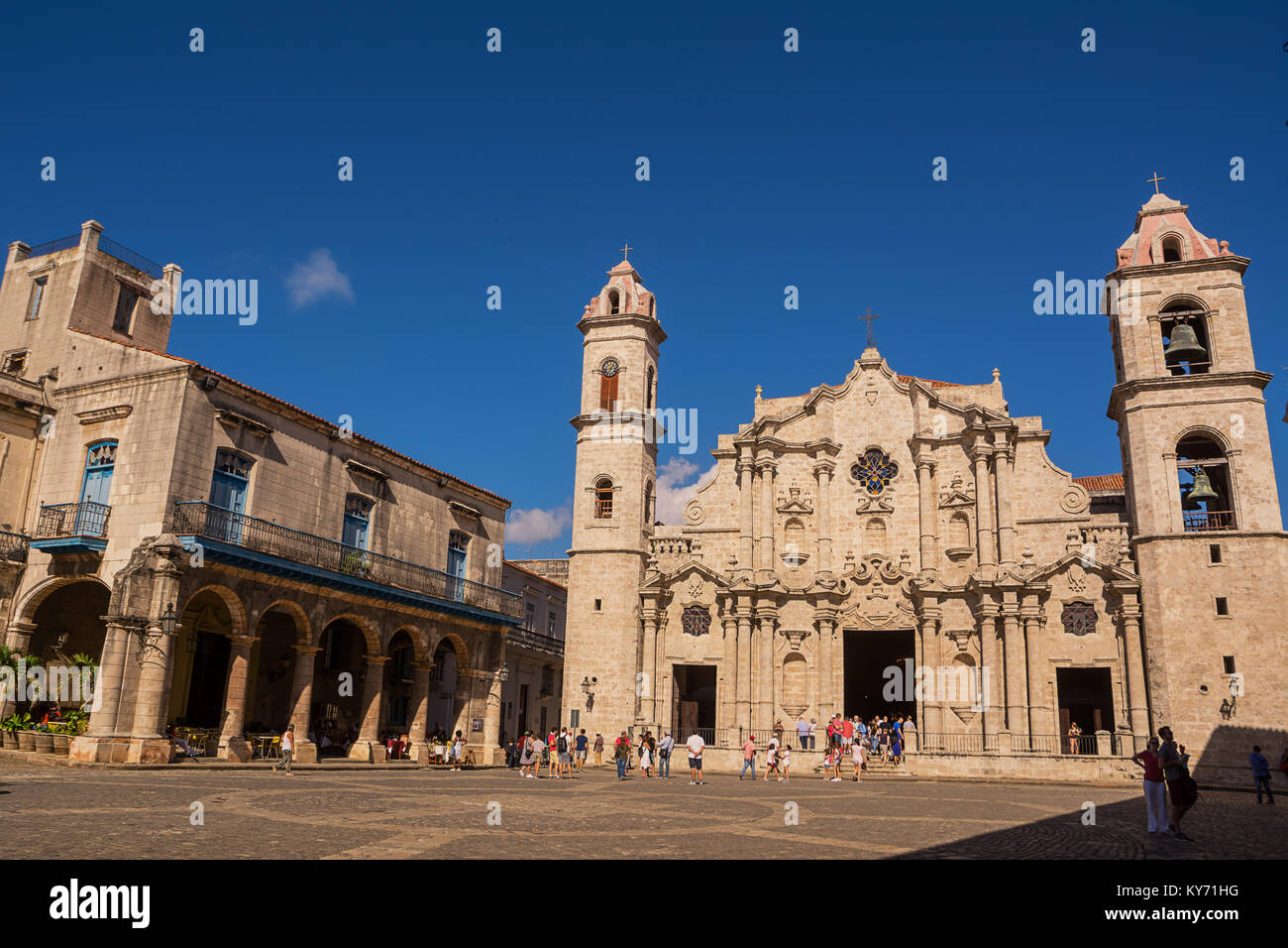 Havana, Cuba - December 3, 2017: Square and Cathedral Church of Havana (Cuba) and tourists and faithful in a December Sunday Stock Photo