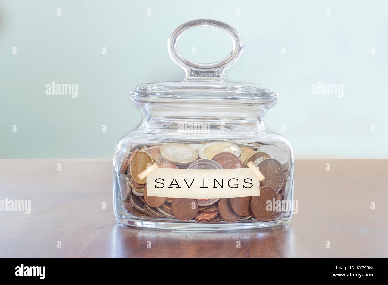 savings concept. glass jar full of coins Stock Photo