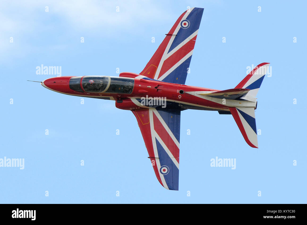 Royal Air Force BAe Hawk T1 solo airshow display jet trainer plane in special union flag or union jack British colour scheme. Red white and blue flag Stock Photo