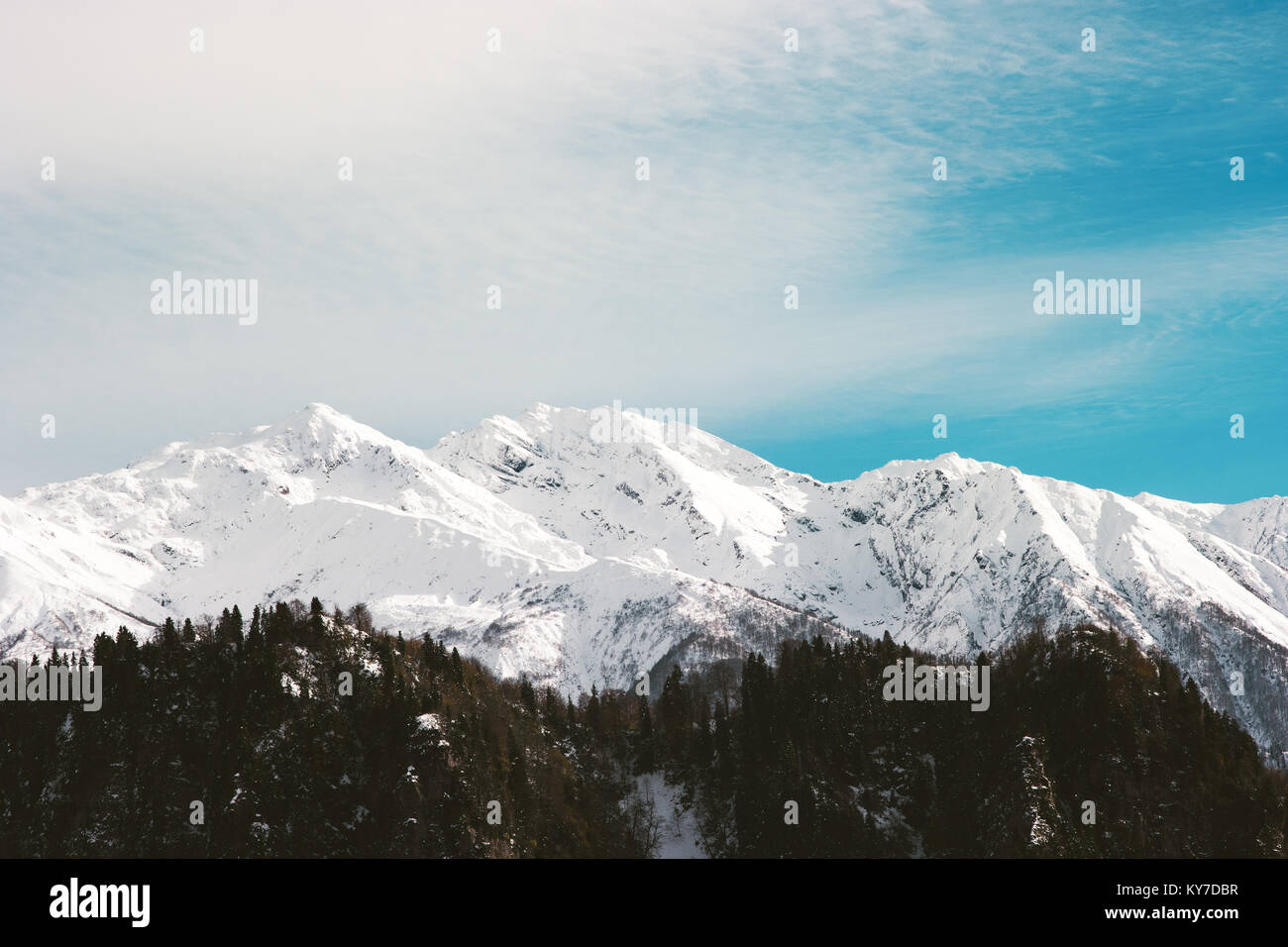 Snowy Mountains and blue sky with clouds Winter Landscape Travel serene ...