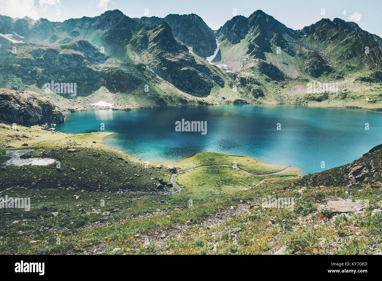 Turquoise Lake and Mountains range Landscape Summer Travel serene aerial view Stock Photo