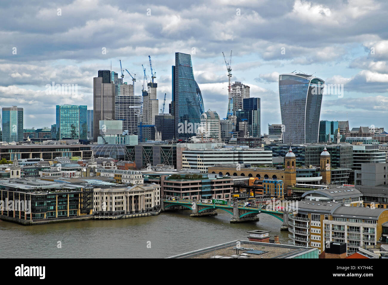 City of London skyline view of the financial district on a cloudy dull day with cranes and skyscrapers in 2017 London England UK  KATHY DEWITT Stock Photo