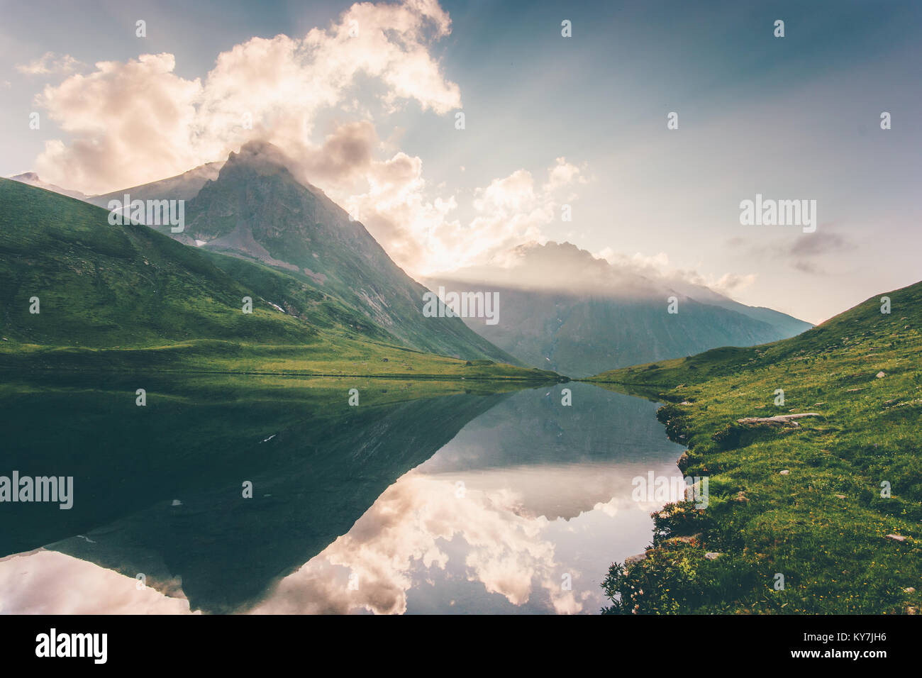 Sunset Landscape Mountains and Lake reflection with sky clouds Summer ...