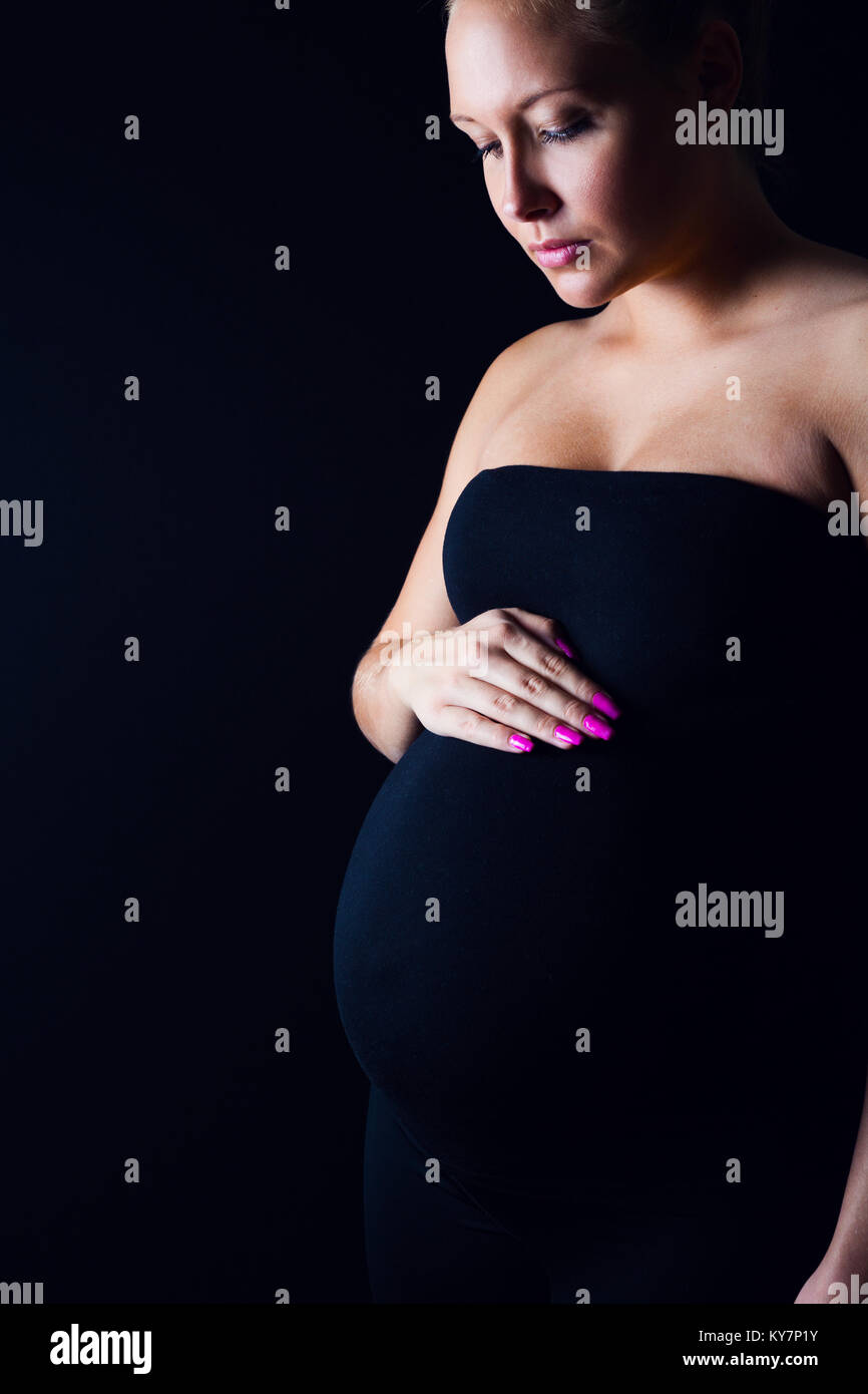 Pregnant black woman vertical hi-res stock photography and images - Alamy