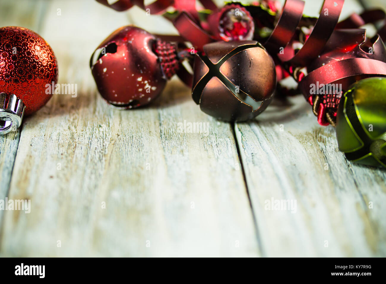 A Christmas holiday lights, ornaments, and bells background Stock Photo