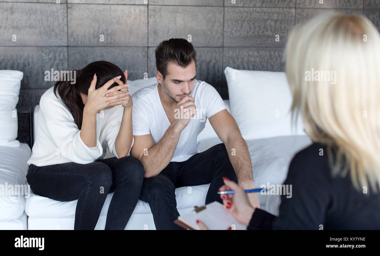 Young sad man and woman on couple therapy, marriage problems Stock Photo