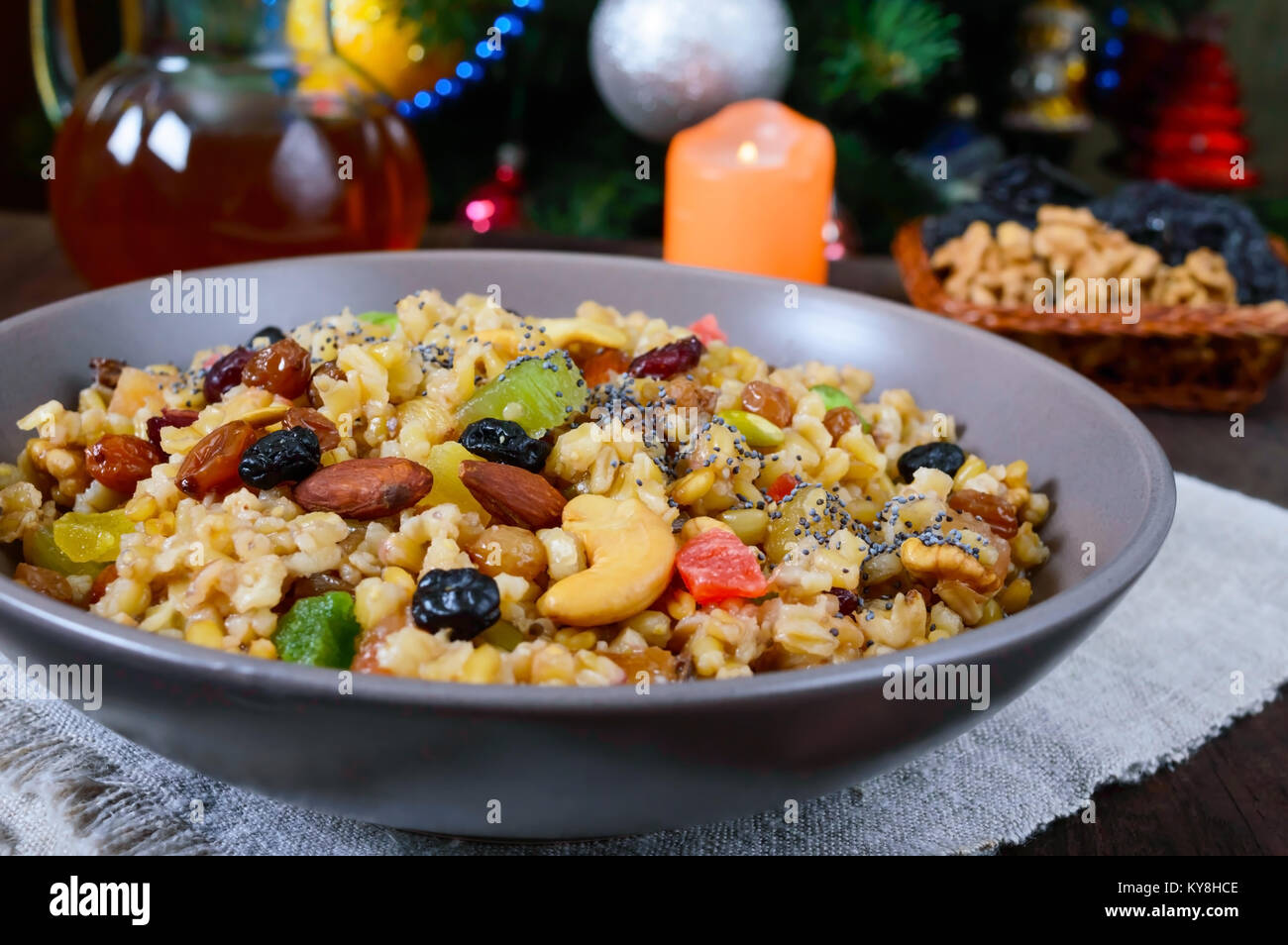 Wheat porridge with different nuts, dried berries, poppy seeds, raisins