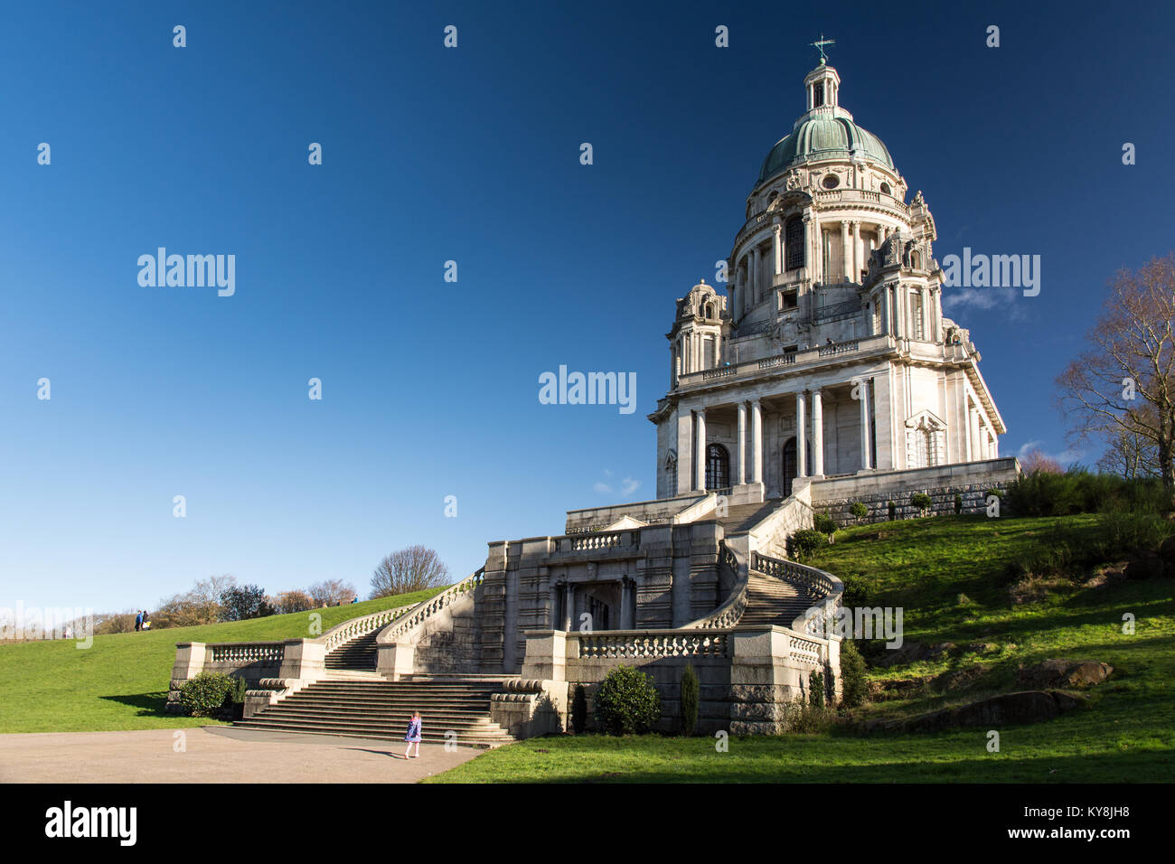 Lancaster, England, UK - November 12, 2017: Sunshine lights up the Portland Stone structure of the Ashton Memorial, a large Baroque folly in Williamso Stock Photo