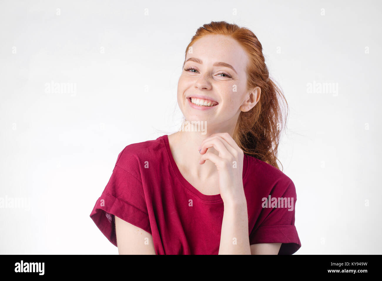 smiling woman posing isolated on white background Stock Photo - Alamy