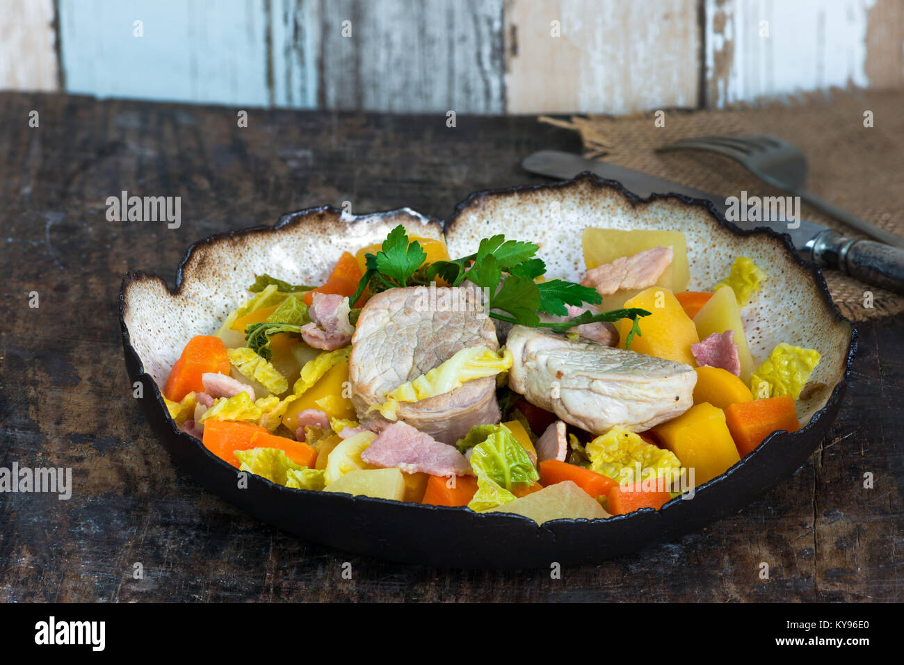 Irish pork stew with potatoes, cabbage, carrot, swede and bacon cooked