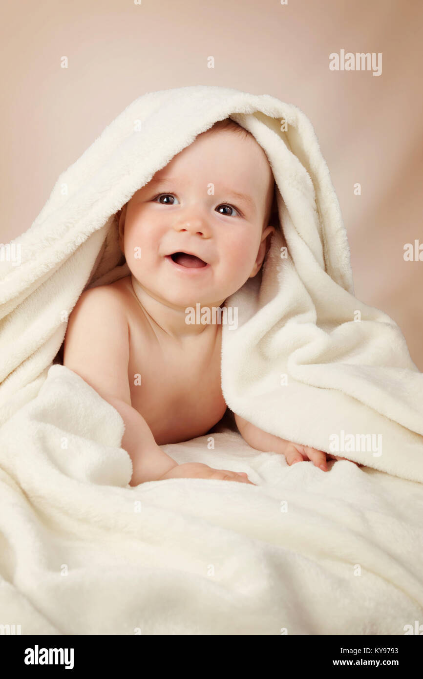 Cute baby in a towel Stock Photo Alamy