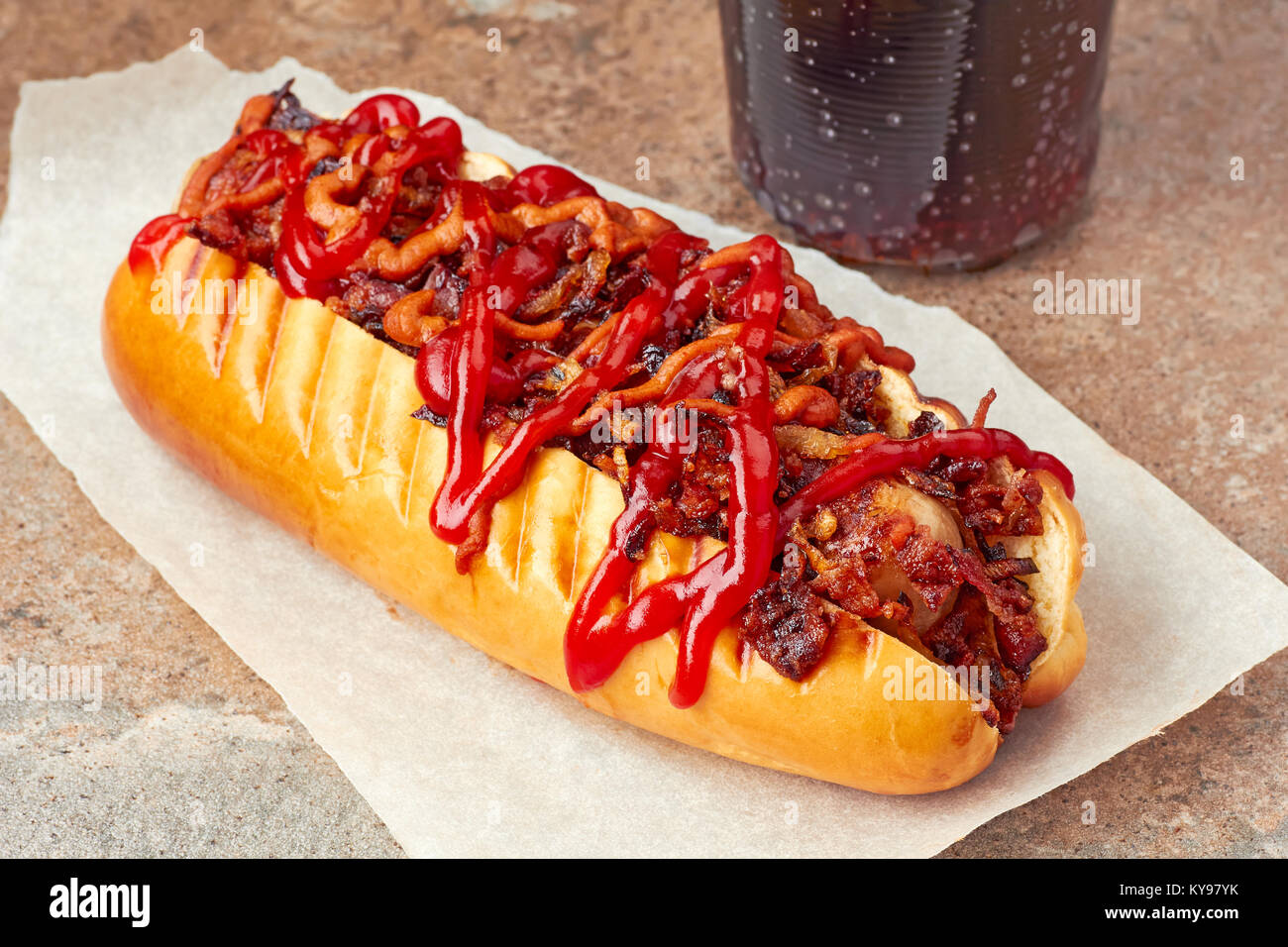 Tasty hot dog with sauces and toppings Stock Photo Alamy