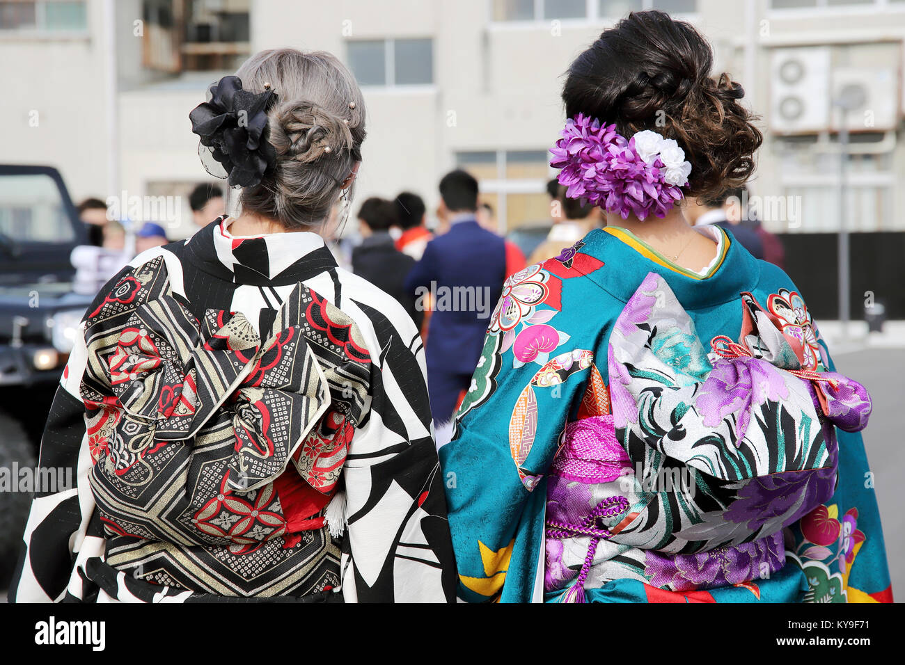 Young Japanese Women Wearing Traditional Kimono For The Coming Of