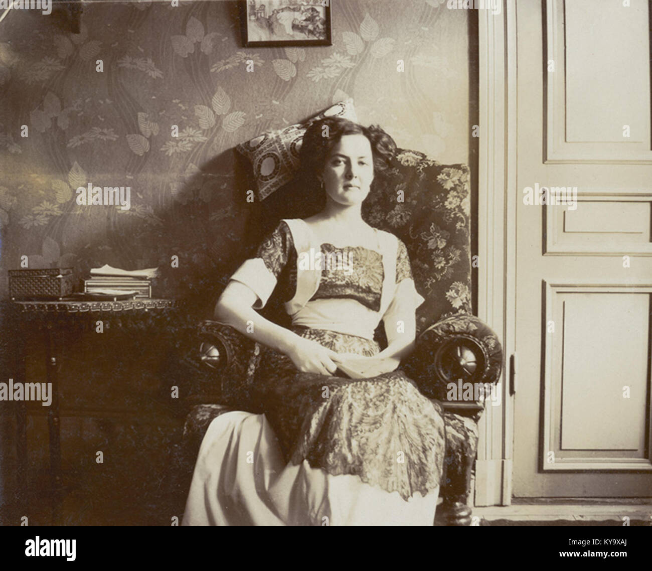 Portrait depicts woman seated hi-res stock photography and images - Alamy