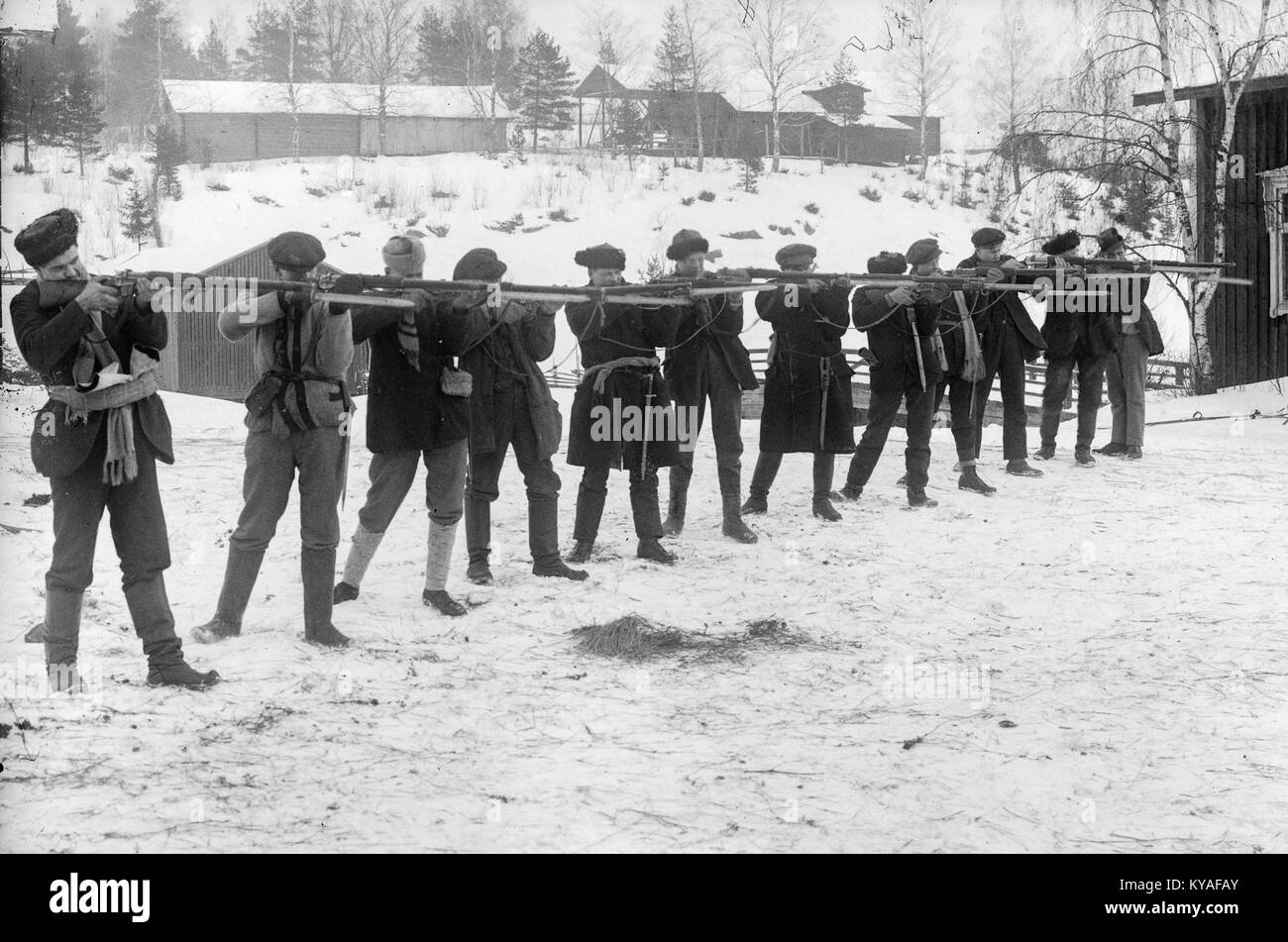 A photograph showing a Red Guard unit in target practice at Ruovesi ...