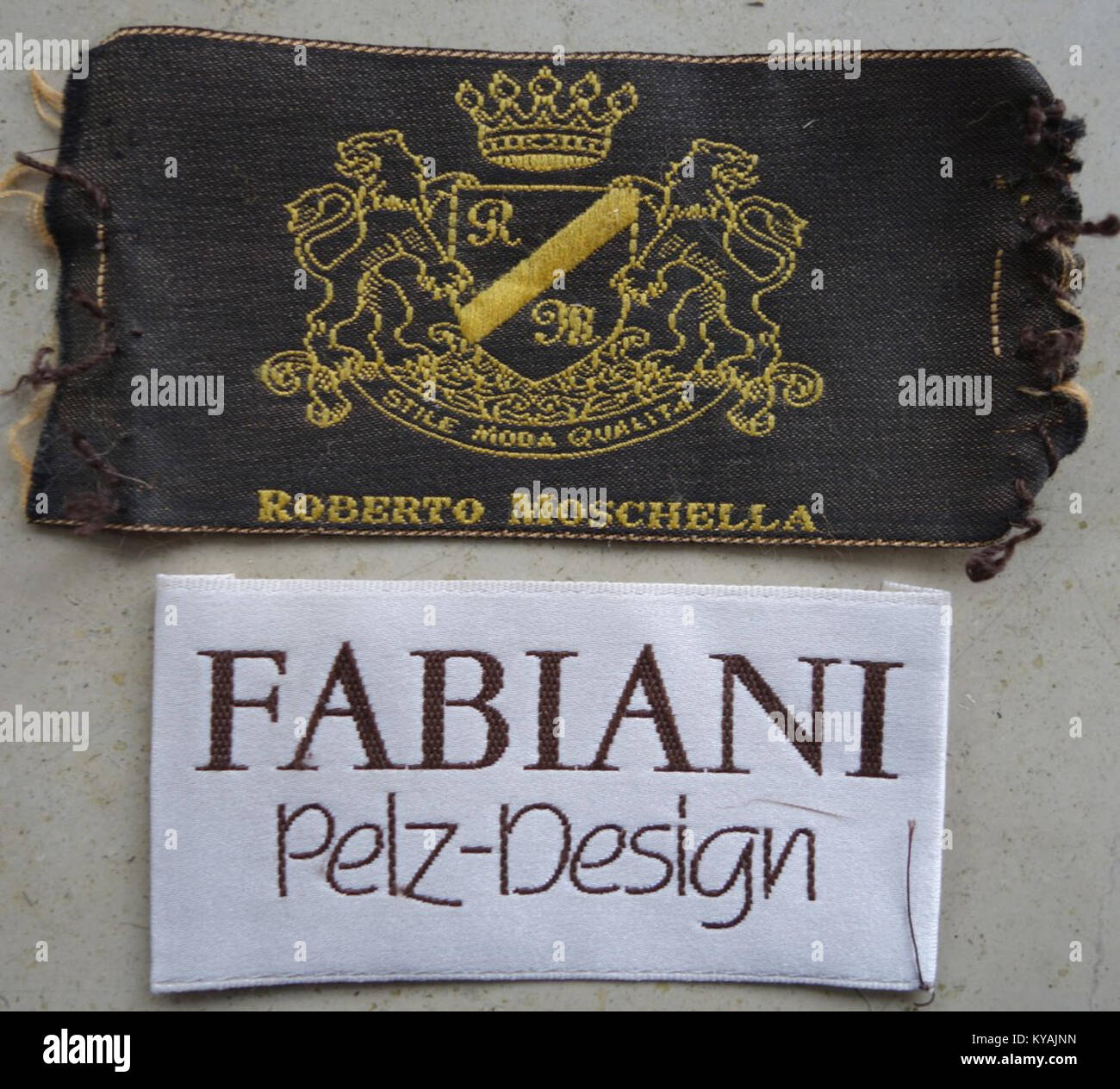 An image of labels from German fur suppliers, focusing on the details of the product packaging and branding for fur items. Stock Photo
