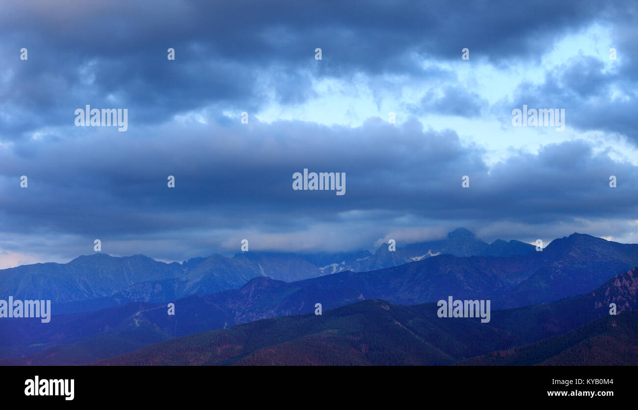 Poland, Tatra Mountains, Zakopane - Kasprowy Wierch, Beskid, Skrajna Turnia, Swinica and Koscielec peaks - High Tatra under clouds Stock Photo
