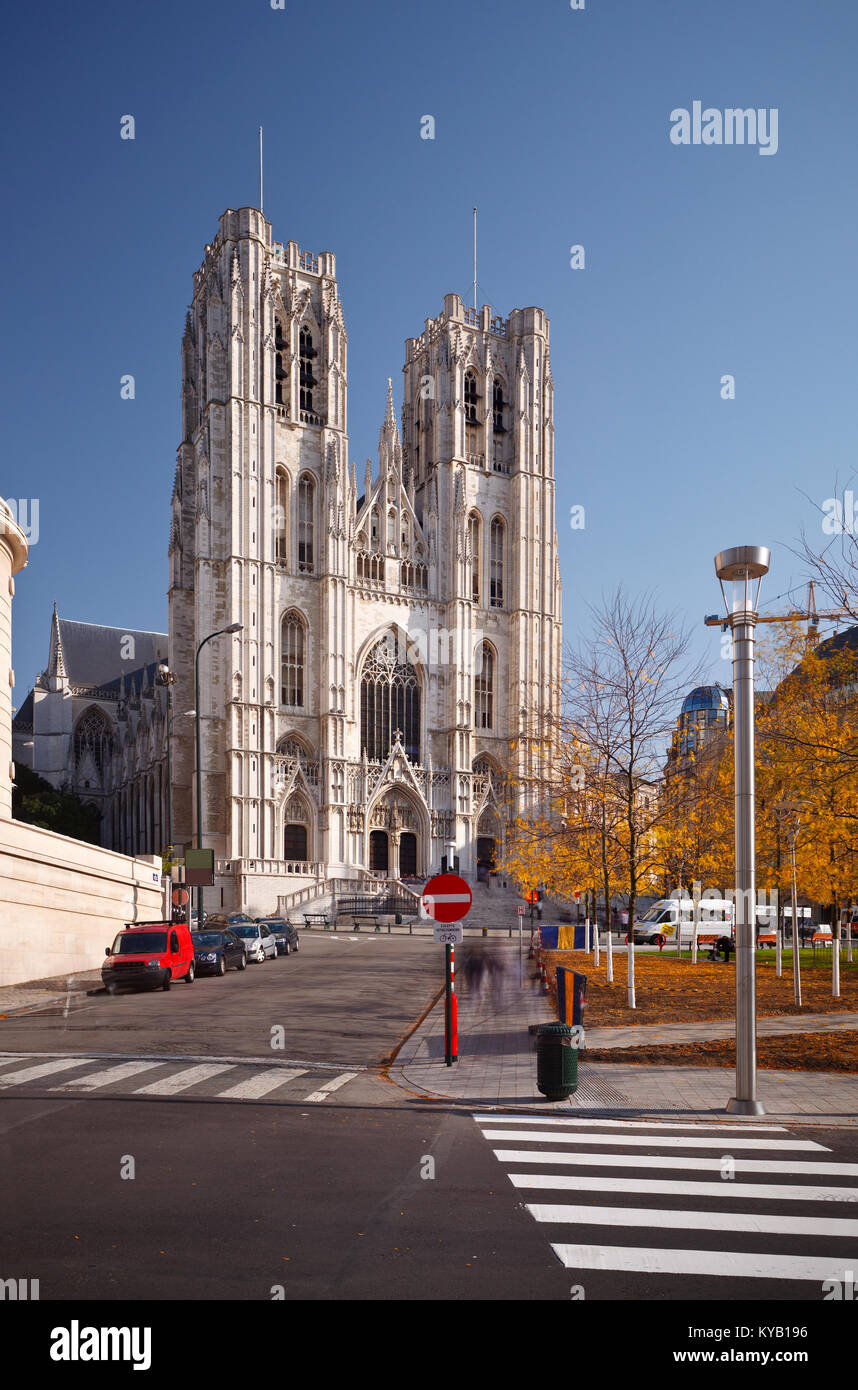 The impressive cathedral of Brussels, Belgium. Long exposure shot to blur people and passing cars. Stock Photo