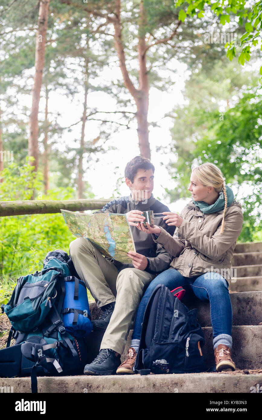 Woman man hiking map hi-res stock photography and images - Alamy