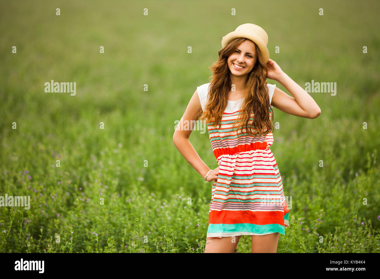 Portrait of happy girl in wheat field Stock Photo - Alamy