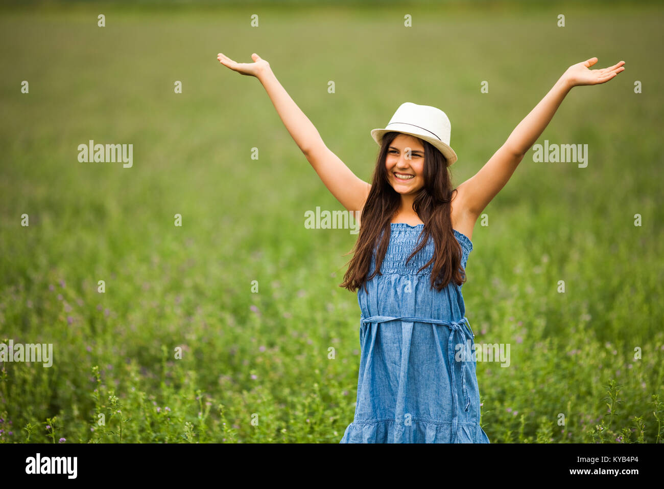 Portrait of happy girl in wheat field Stock Photo - Alamy