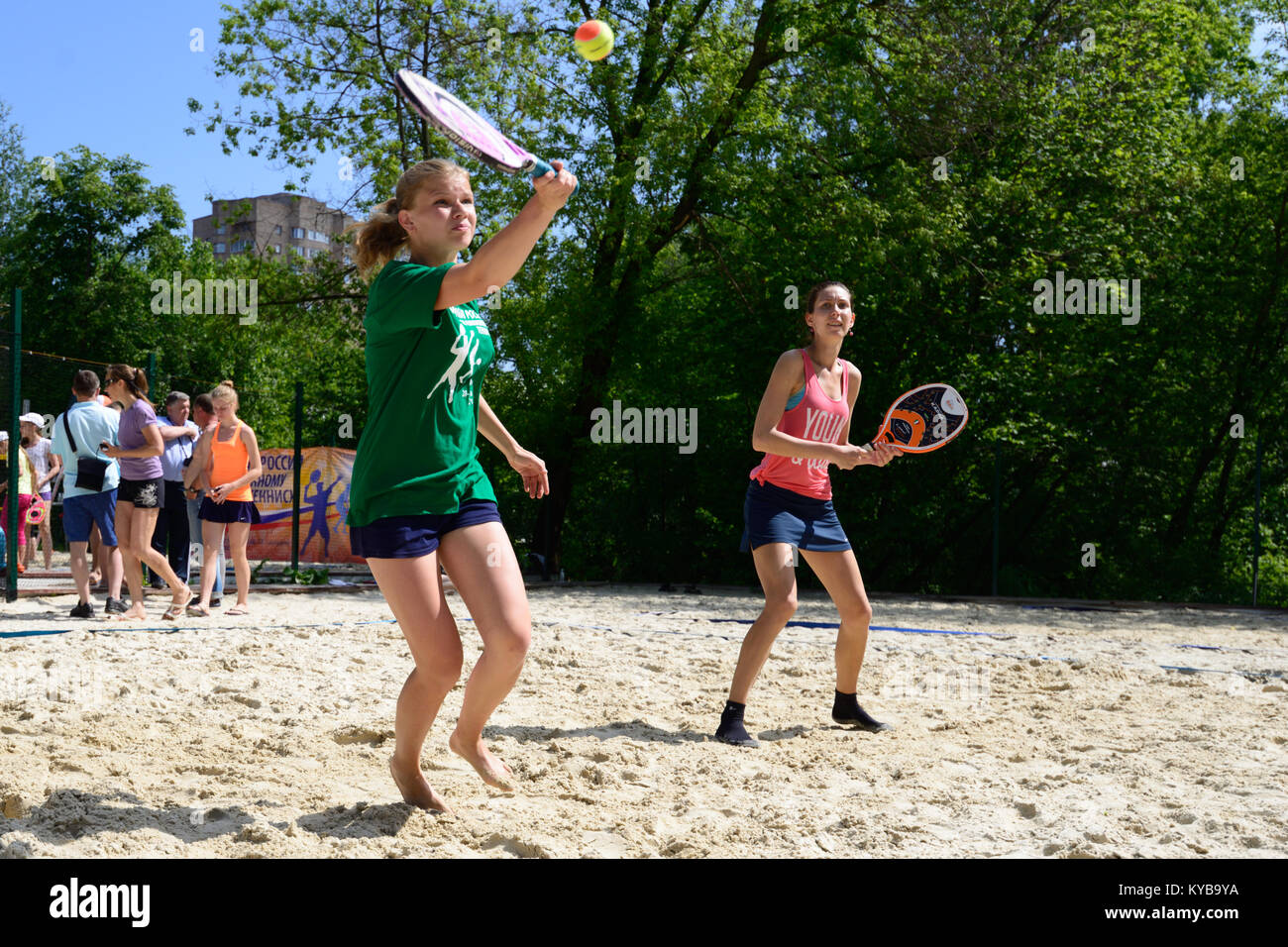 Moscow, Russia - May 30, 2015: Yulia Chubarova and Nikolay Guriev in the match of Russian beach tennis championship. 120 adults and 28 young athletes  Stock Photo