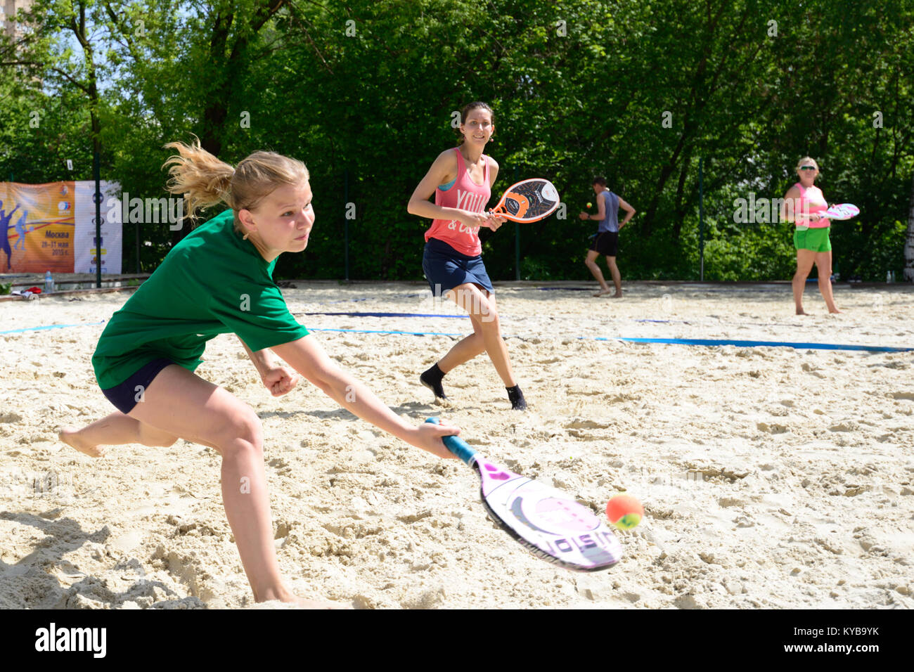 Moscow, Russia - May 30, 2015: Yulia Chubarova and Nikolay Guriev in the match of Russian beach tennis championship. 120 adults and 28 young athletes  Stock Photo