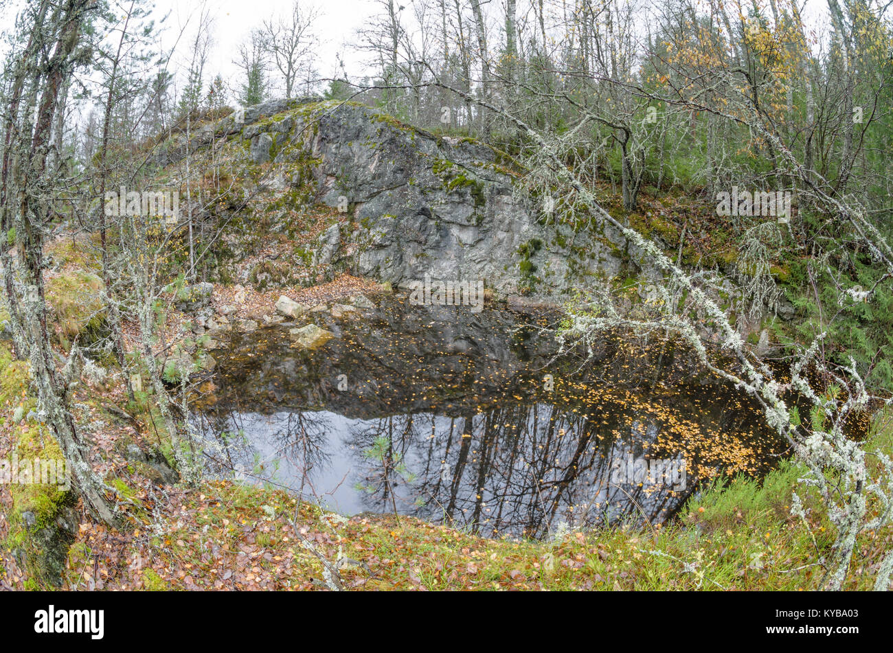 Landsverk 2, Evje Mineralsti. In late autumn there are no leaves and relics are visible in the forest, so it is the best time to visit this place. Stock Photo