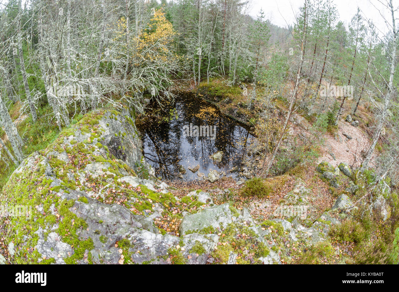 Landsverk 2, Evje Mineralsti. In late autumn there are no leaves and relics are visible in the forest, so it is the best time to visit this place. Stock Photo