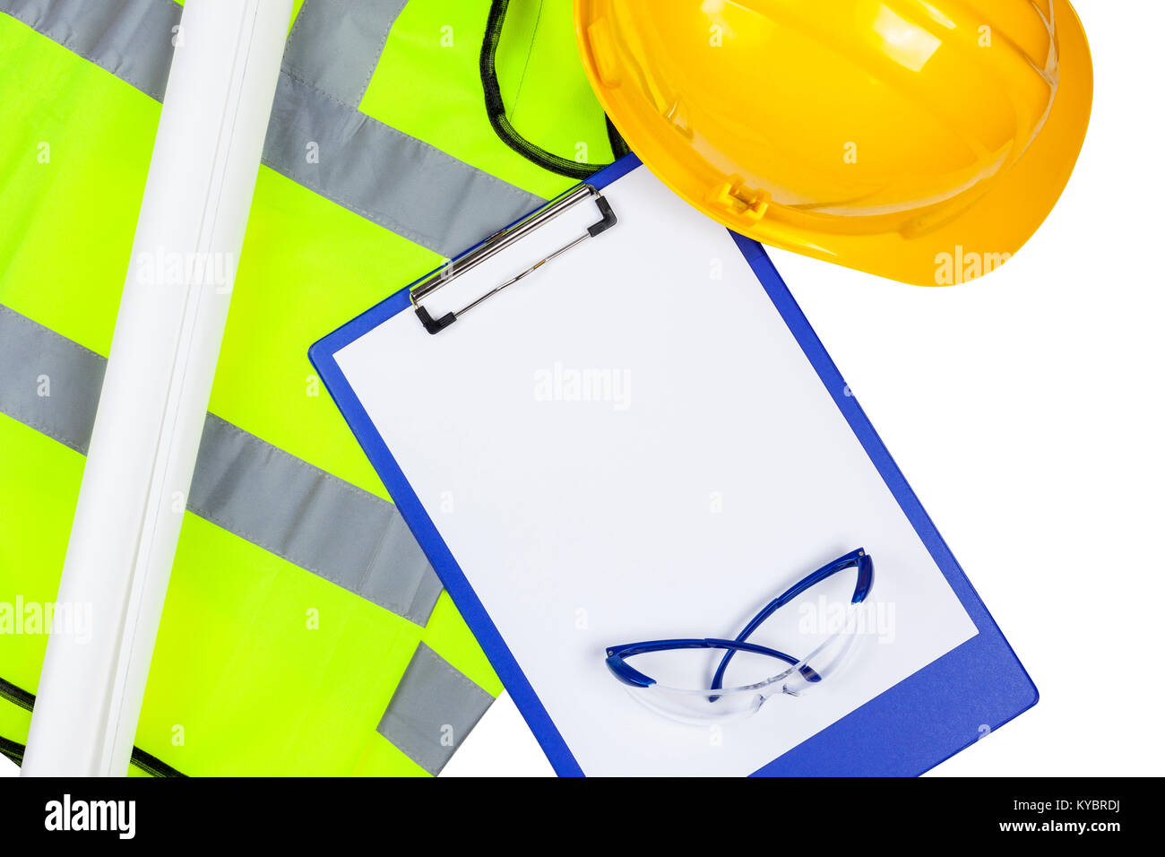 Yellow hi vis safety vest and hard hat with glasses and a clipboard with copyspace Stock Photo