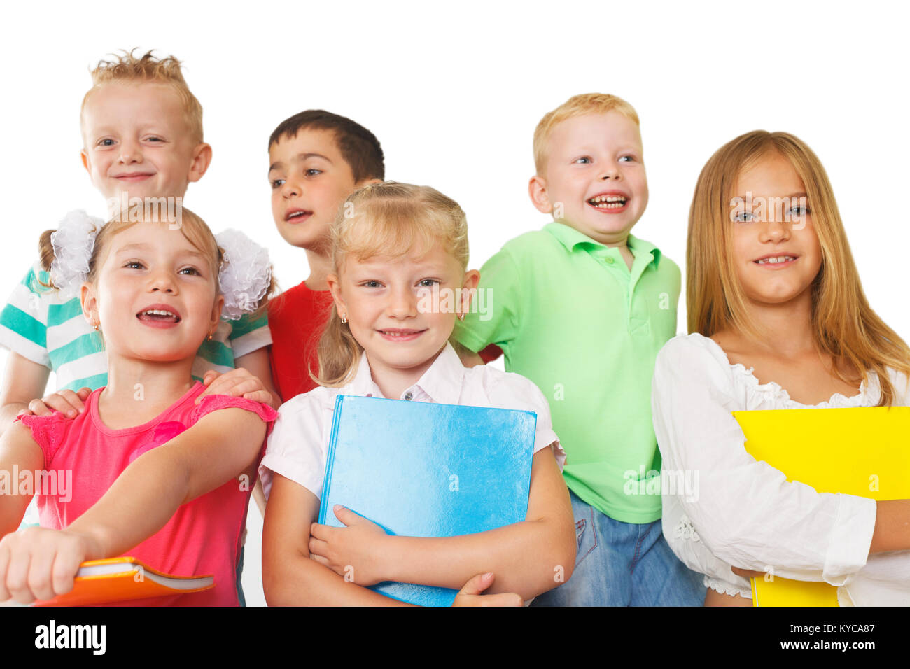 Group of preschoolers with books Stock Photo