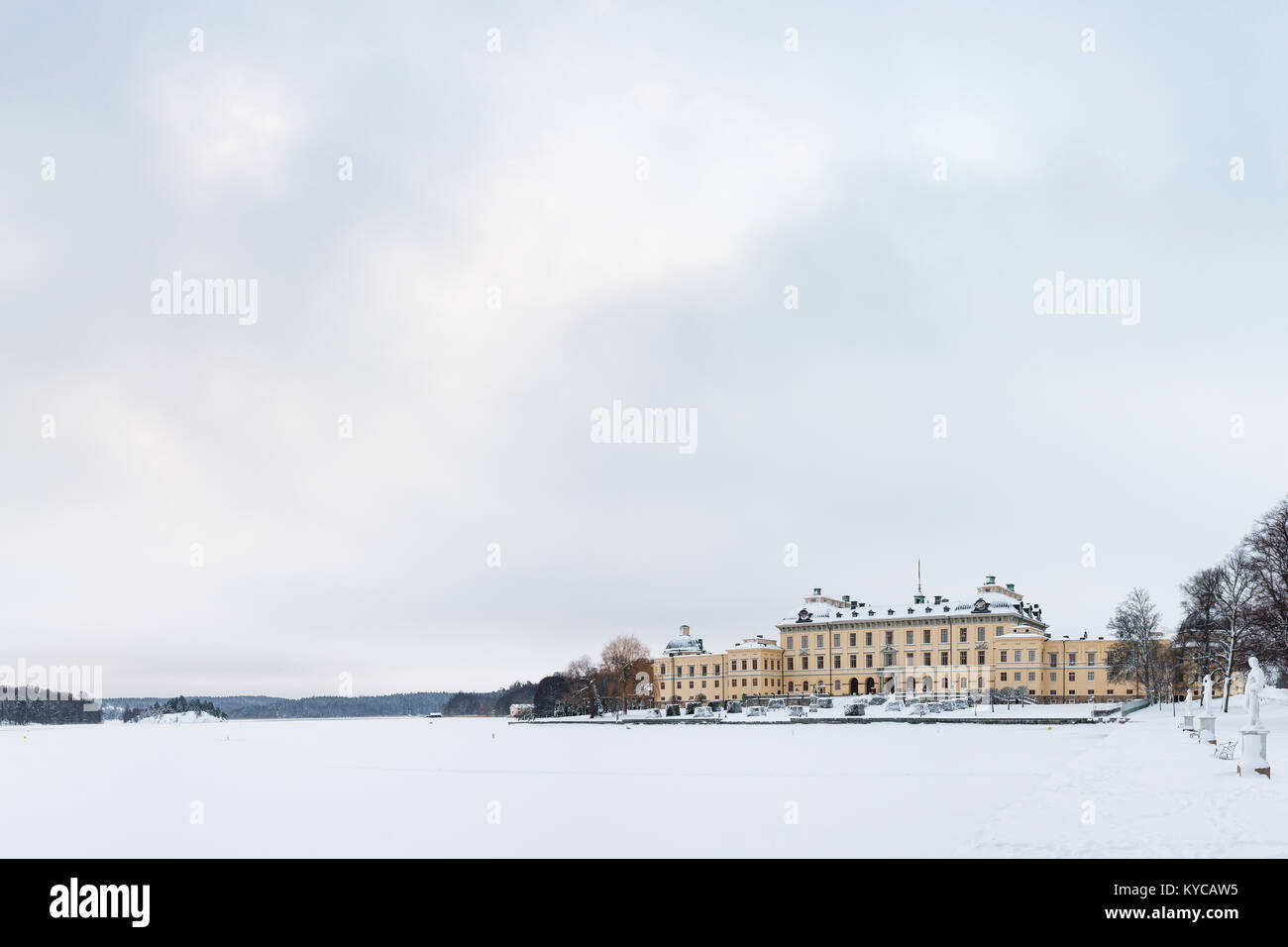 STOCKHOLM, SWEDEN - JANUARY 7, 2017: View over Drottningholm Palace and lake on a winter day. Home residence of Swedish royal family. Famous landmark  Stock Photo