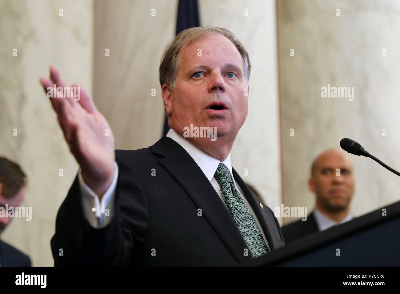 U.S. Senator Doug Jones speaks after being sworn-in as the first Democratic Senator from Alabama in 30-years at the U.S Capitol January 3, 2017 in Washington, DC. Stock Photo