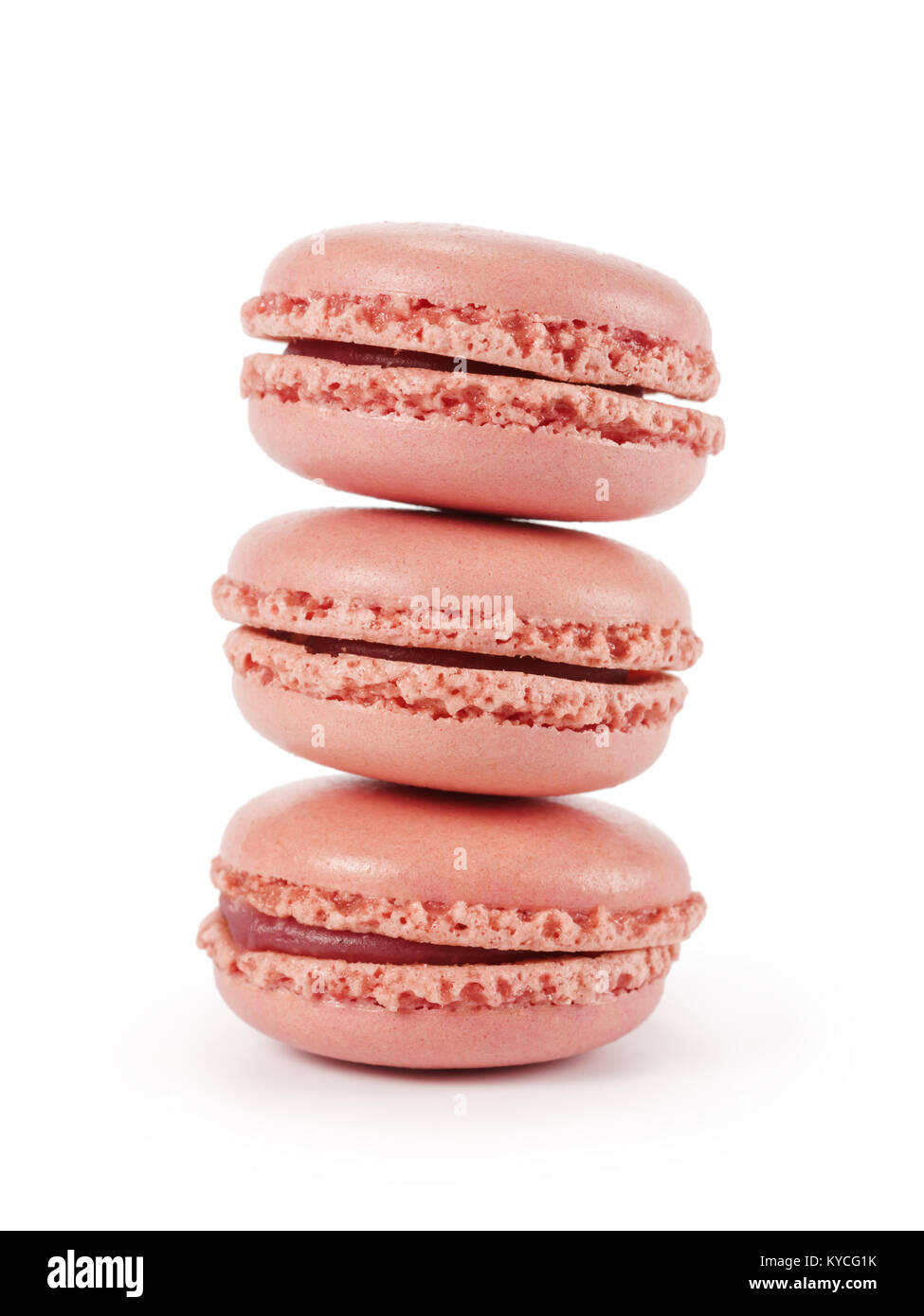 three pink macarons isolated on white background Stock Photo