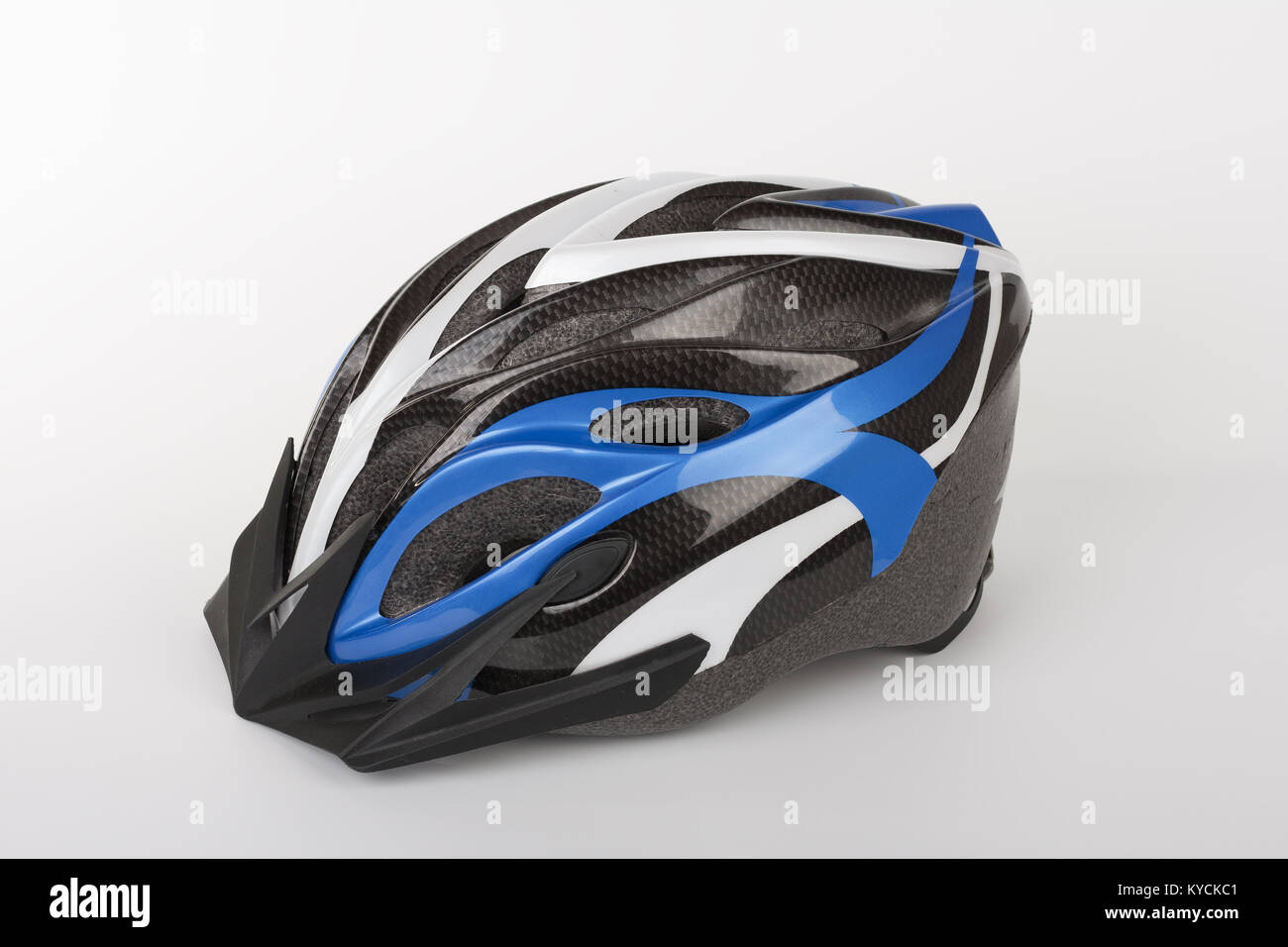 Blue bicycle helmet, protection of head injury on cycling, studio photo, isolated on background