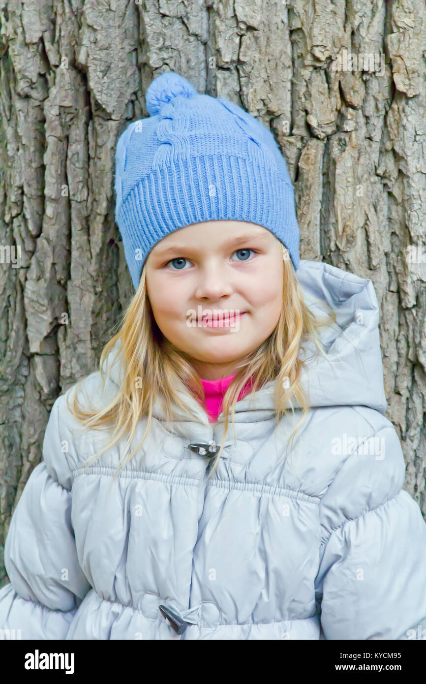 Cute girl with blond long hair and blue eyes Stock Photo - Alamy