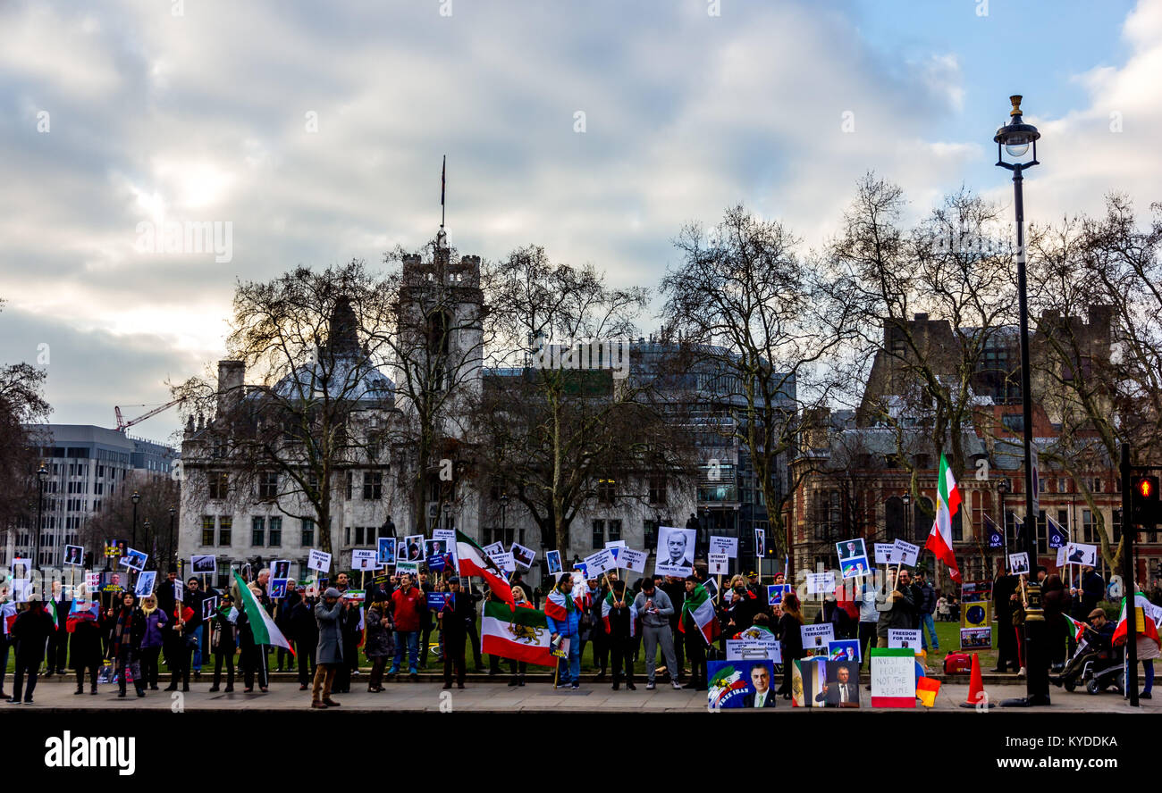 Parliament Square, London, UK. 14th Jan, 2018. Iranian protesters gather opposite the British Parliament building to demonstrate against human rights abuses by the current regime in Iran. Credit: Alan Fraser/Alamy Live News Stock Photo