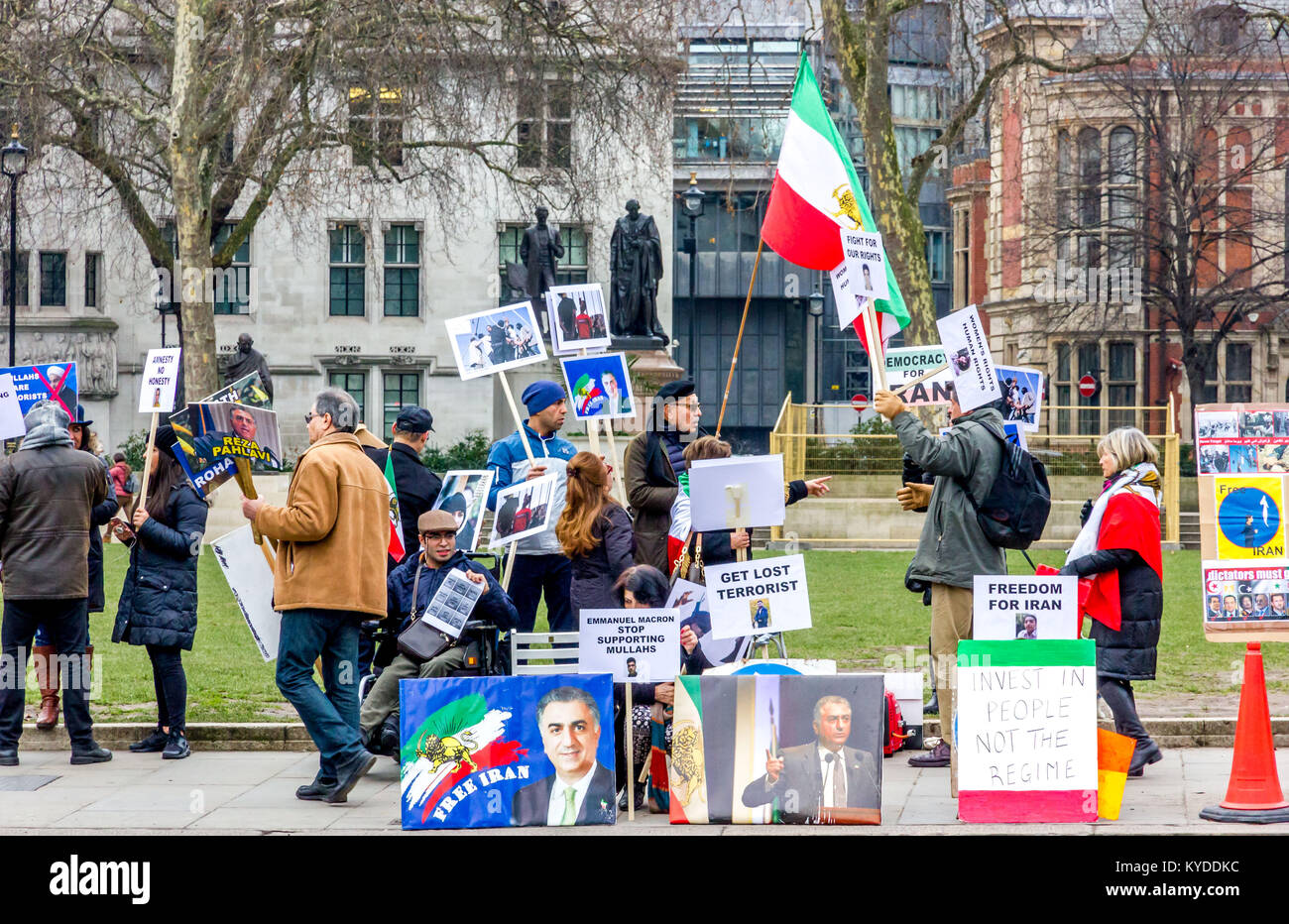 Parliament Square, London, UK. 14th Jan, 2018. Iranian protesters gather opposite the British Parliament building to demonstrate against human rights abuses by the current regime in Iran. Credit: Alan Fraser/Alamy Live News Stock Photo