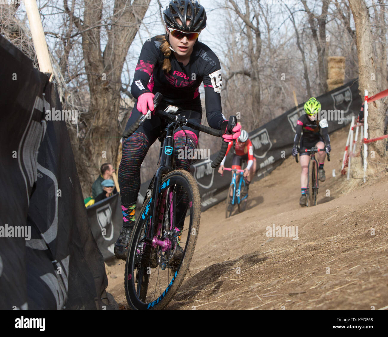 Reno, Nevada, USA. 14th Jan, 2018. KATHRYN MCDICKEN, team ASU, hugs the fence with challengers on her wheel during the Women's U23 USA Cycling Cyclocross National Championships at Rancho San Rafael Park in Reno, Nevada, on Sunday, January 14, 2018. Credit: Tracy Barbutes/ZUMA Wire/Alamy Live News Stock Photo