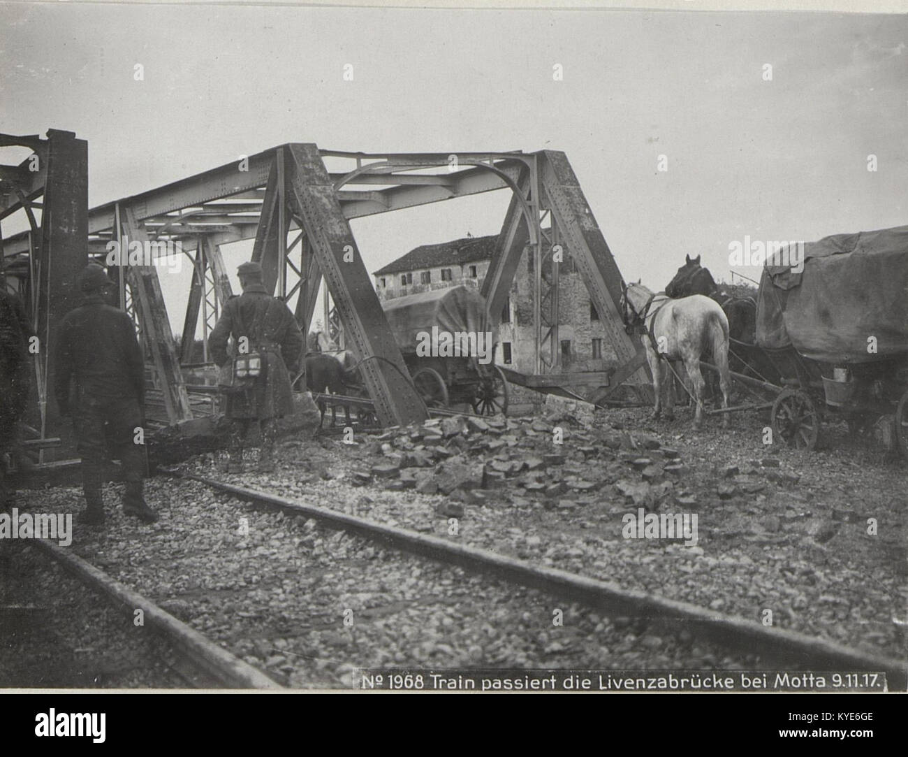 A 1917 photograph showing a train crossing the Livenza Bridge near ...