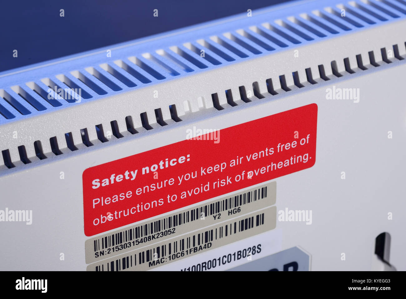 Safety warning notice on a modem router Stock Photo