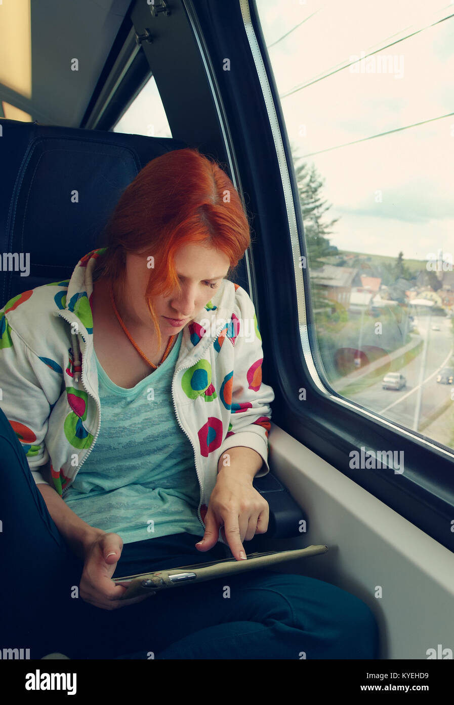 woman riding on a train Stock Photo
