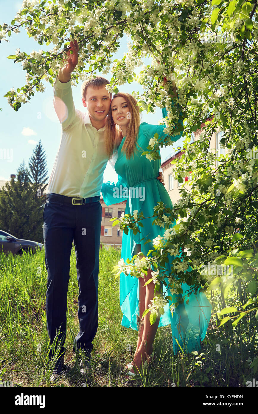 Young happy couple in love outdoors Stock Photo - Alamy