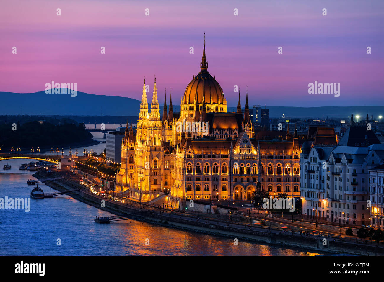 Hungarian Parliament Building illuminated at twilight in city of Budapest, Hungary Stock Photo