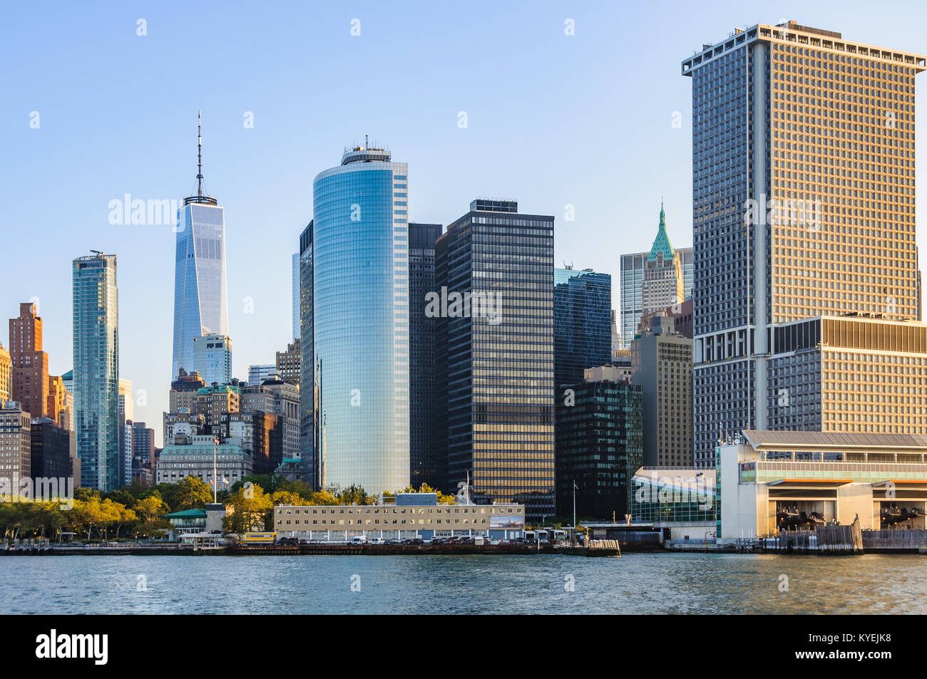 Manhattan Skyline just after sunrise as seen from the Staten Island ferry, New York, USA Stock Photo