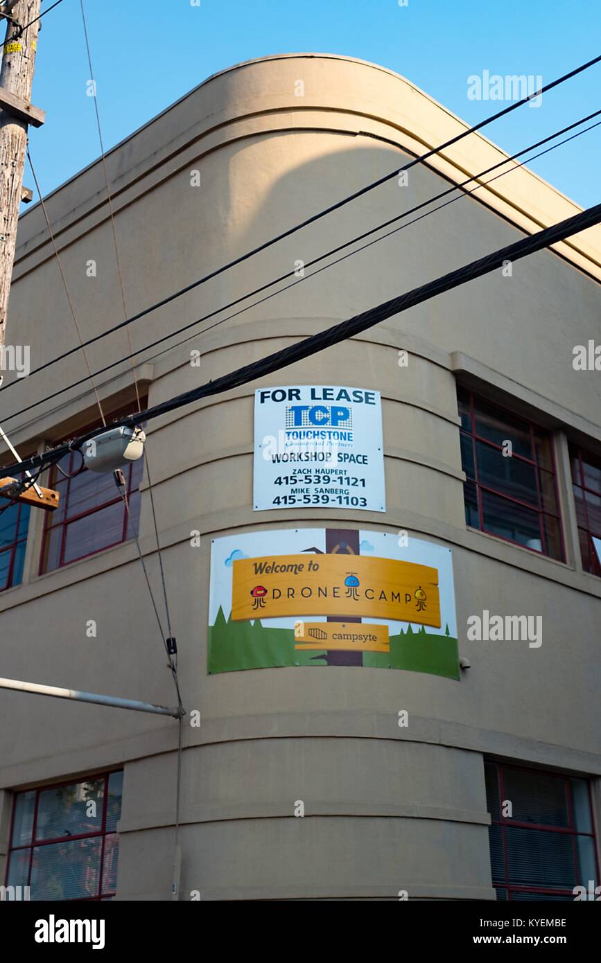 Sign on building reading 'Welcome to Drone Camp', advertising a children's camp which teaches the flying and assembly of drones in the South of Market (SoMa) neighborhood of San Francisco, California, October 13, 2017. () Stock Photo